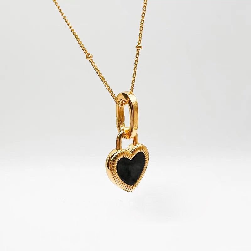 DOUBLE-SIDED HEART NECKLACE 18KT