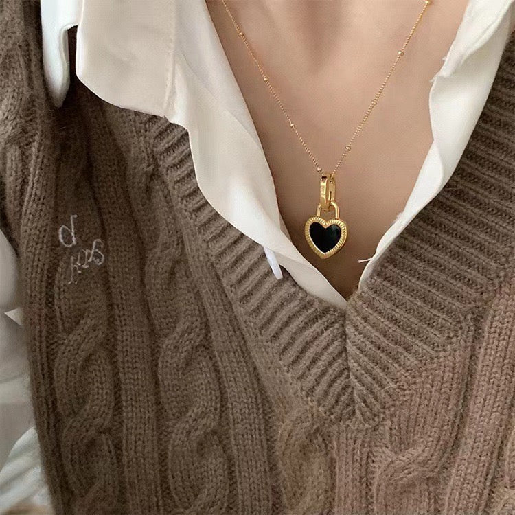 DOUBLE-SIDED HEART NECKLACE 18KT